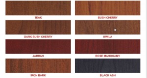 A wood-look security door colour palette featuring teak, bush cherry, dark bush cherry, kwila, jarrah, rose mahogamy, iron bark and black ash.