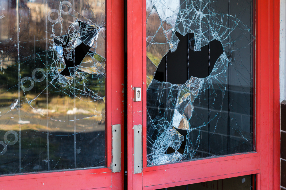 smashed school door window.